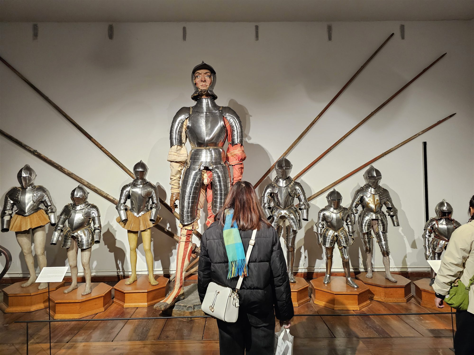 A row of historic suits of armour on display at Ambras Castle