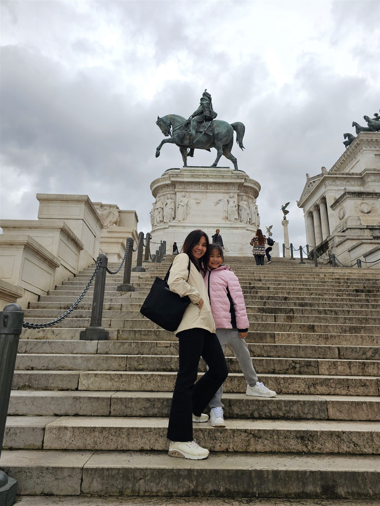 Our family on the wide marble steps of the Vittoriano, the equestrian statue of Victor Emmanuel II above
