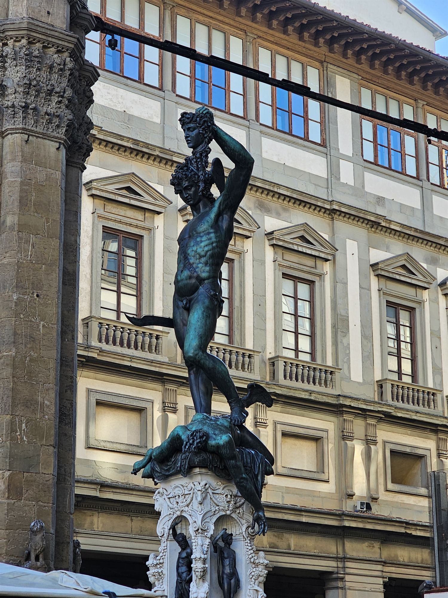 Close-up of Cellini's bronze Perseus holding Medusa's severed head