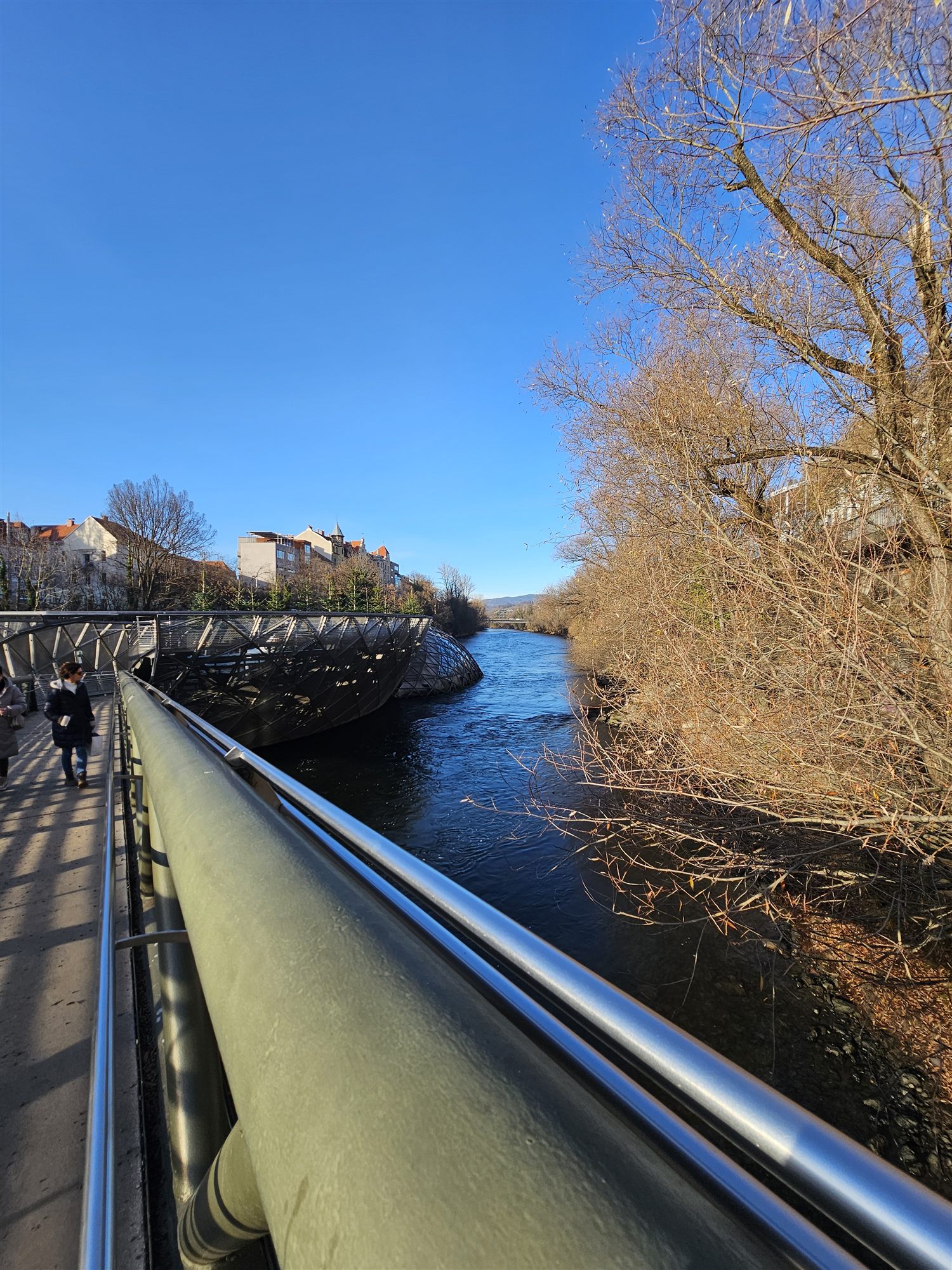 Footbridge leading to the Murinsel platform on the Mur River, Graz