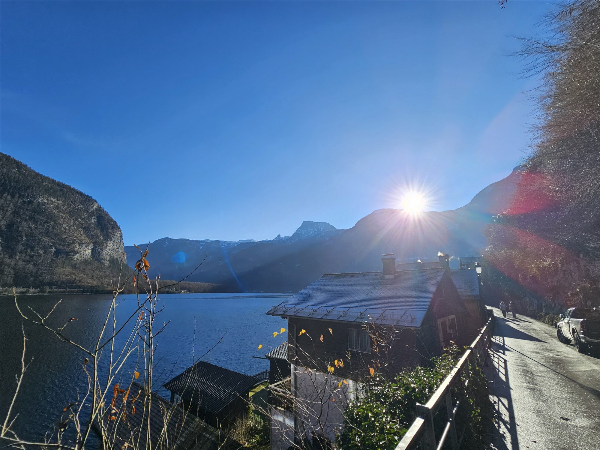 Sunburst over Lake Hallstatt seen from the lakeside walking path