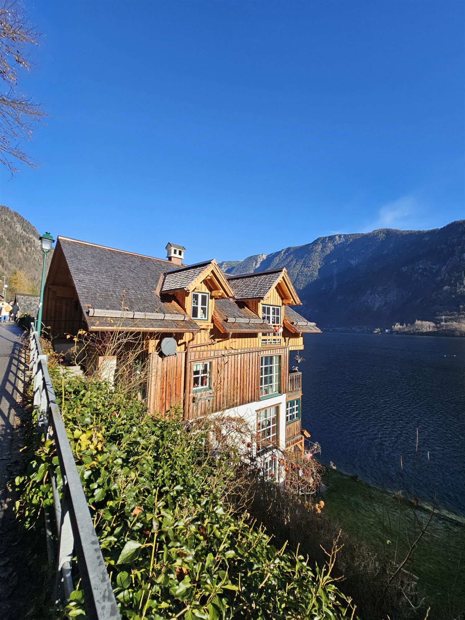 Wooden lakeside house in Hallstatt, built right up to the water's edge
