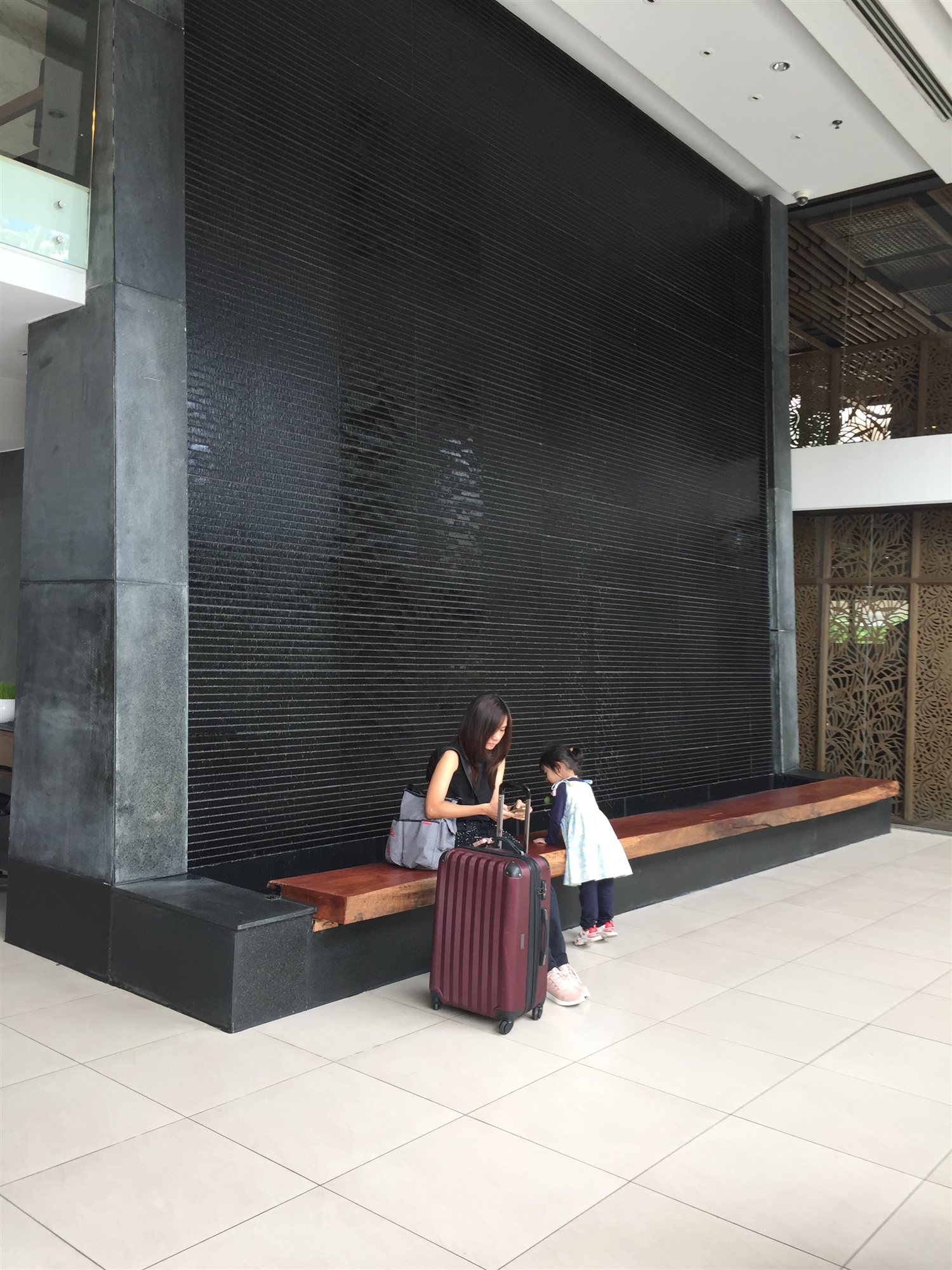 Arriving at the Sila Urban Living lobby with luggage