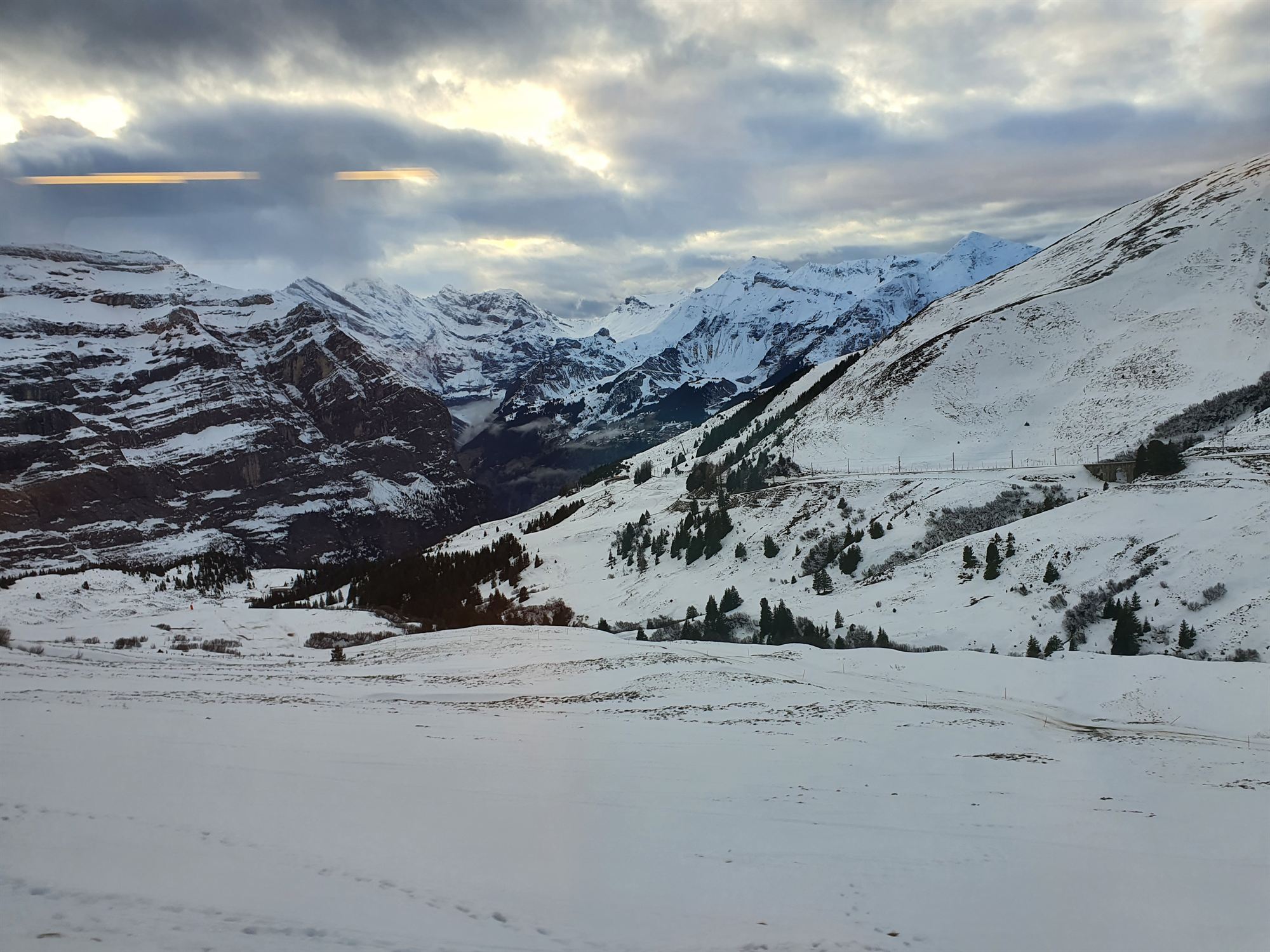 Valley view at dusk from the train window on the way down from Jungfraujoch