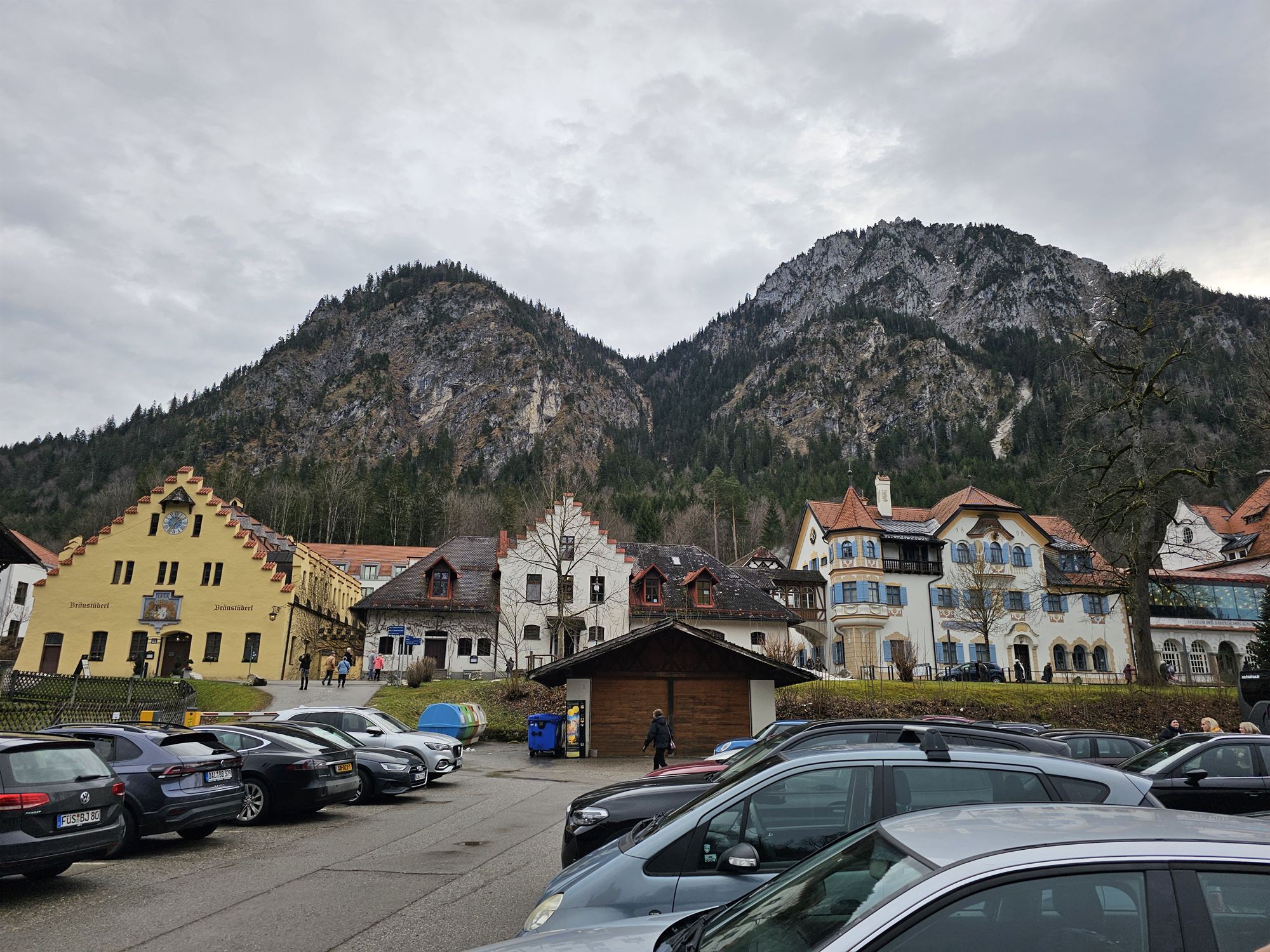 Hohenschwangau village square, colourful Bavarian buildings beneath the mountains