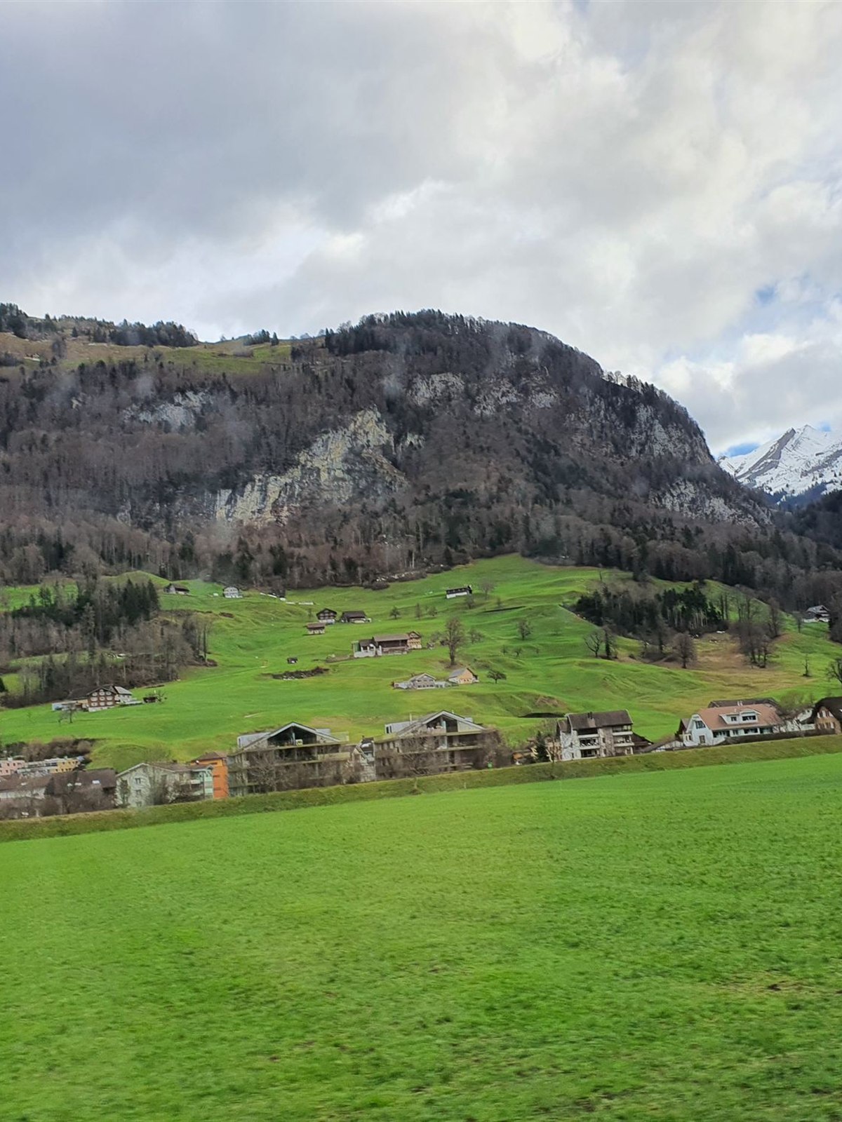 A Swiss village in a green valley on the drive from Lucerne to Engelberg