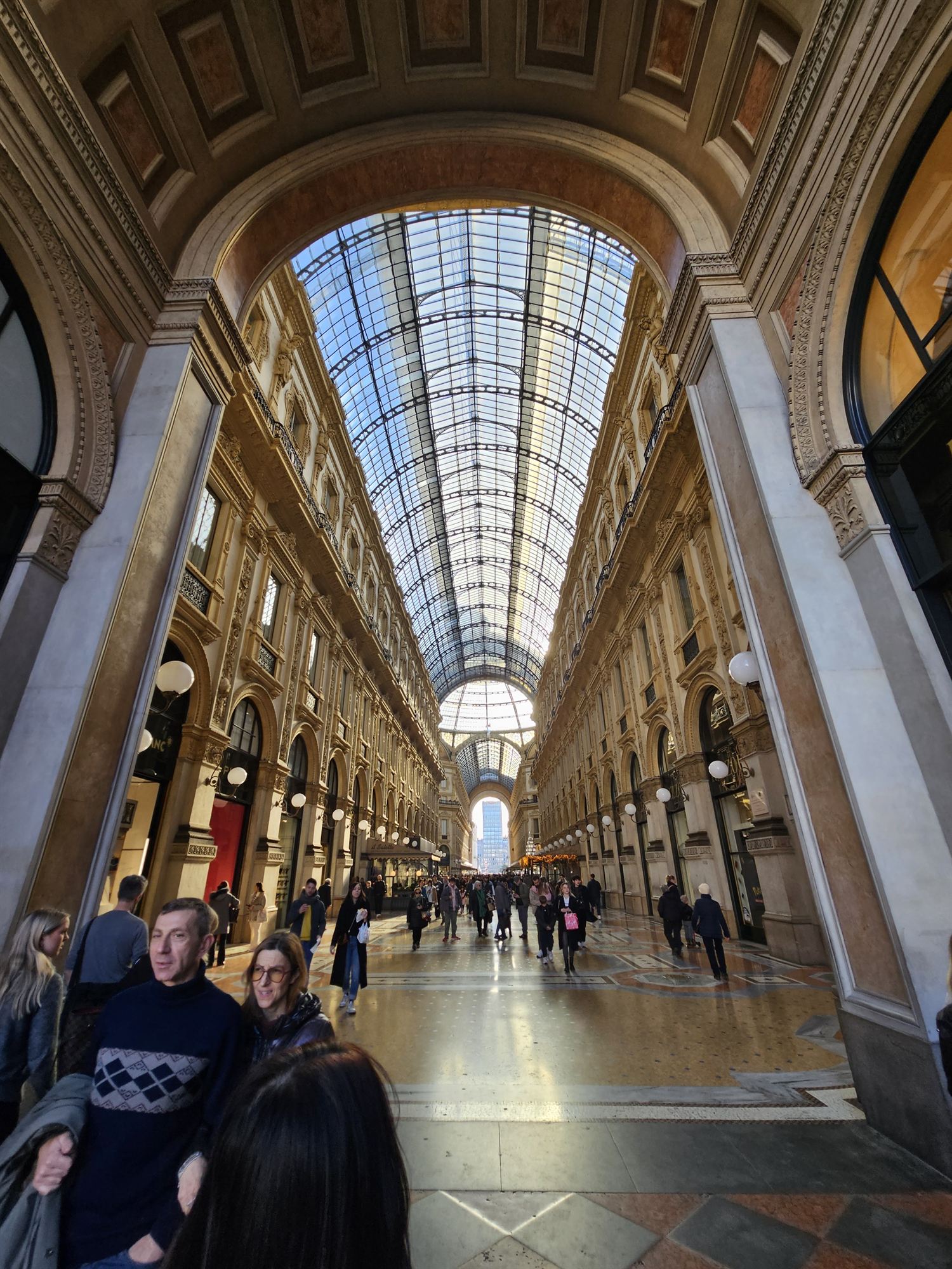 The glass-roofed corridor of the Galleria Vittorio Emanuele II, Milan