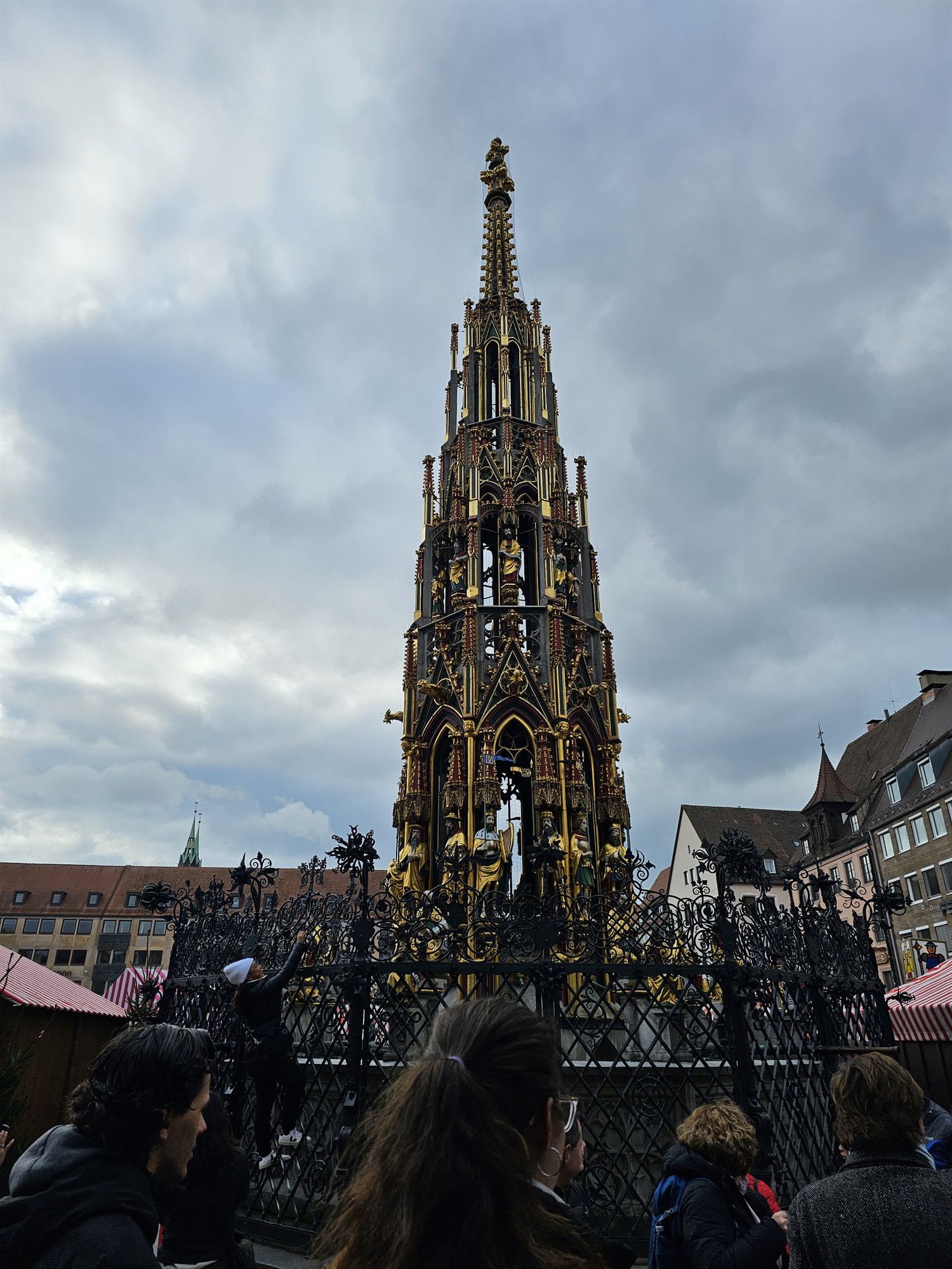 The Schöner Brunnen, a gothic gold fountain in Nuremberg's main market square