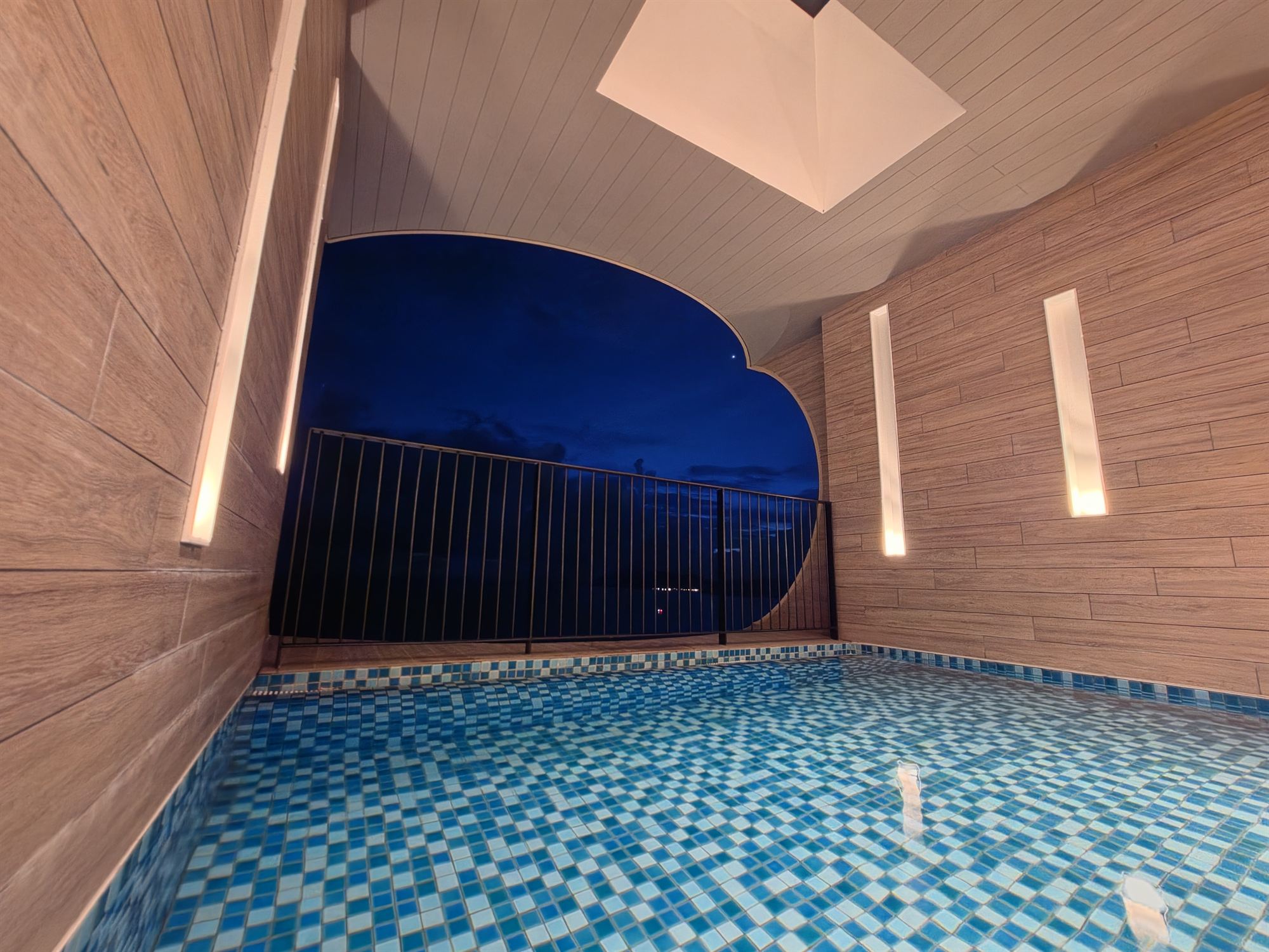 Our private pool at night at PARKROYAL Langkawi, overlooking the dark sea