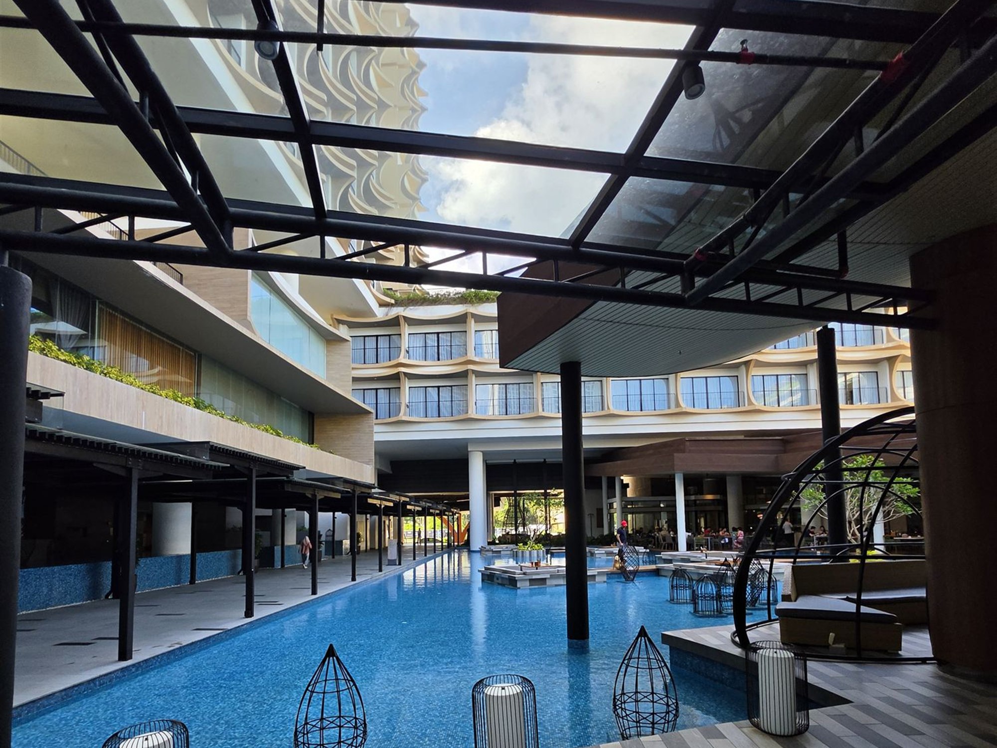Covered walkway beside the pool at PARKROYAL Langkawi