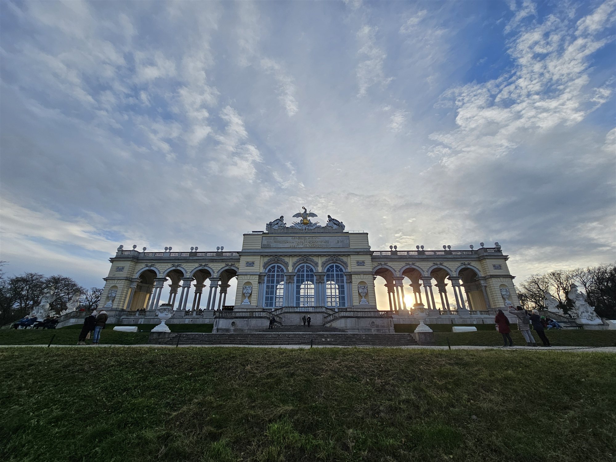 The Gloriette at Sch&ouml;nbrunn Palace lit by the setting sun