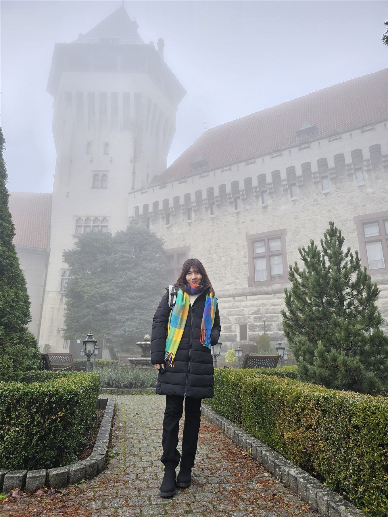 Smolenice Castle emerging through the morning fog, Slovakia