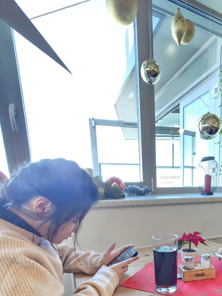 A window seat inside the Untersberg summit restaurant, decorated with Christmas ornaments