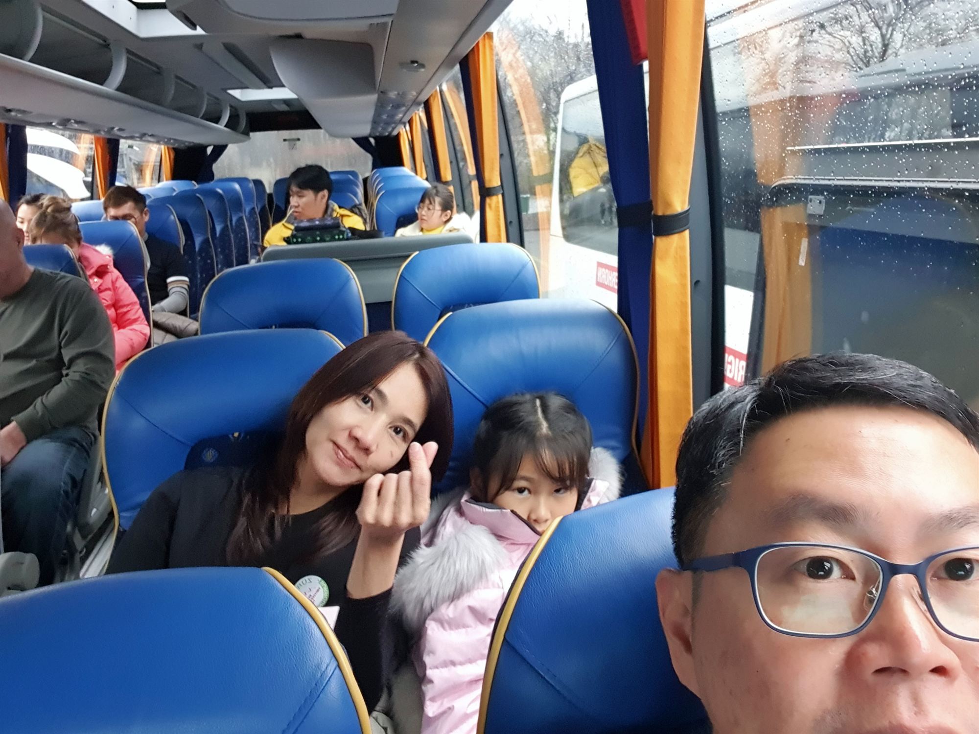 Family on the tour bus during the Zurich city tour