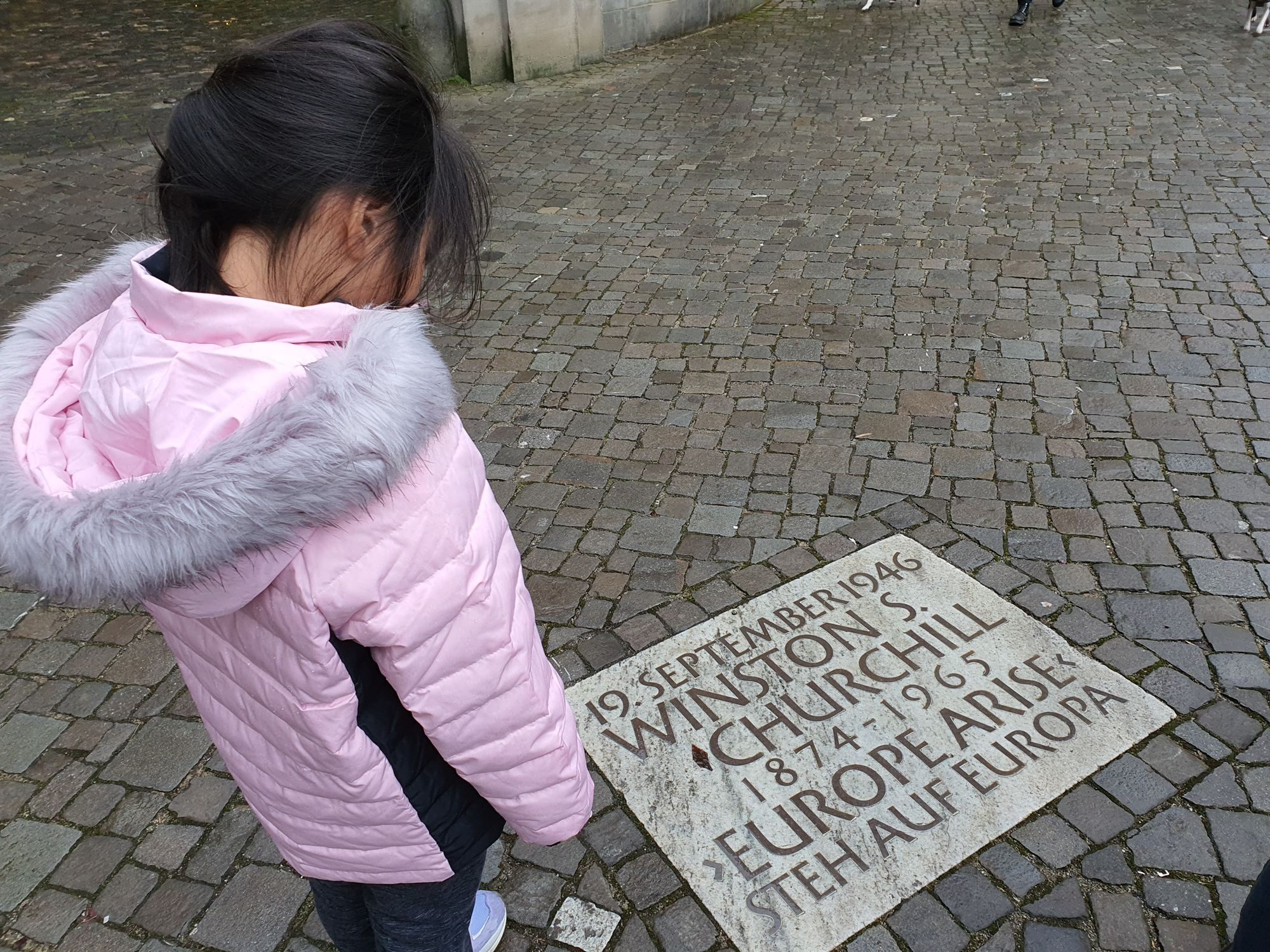 A cobblestone plaque marking Winston Churchill's 1946 speech in Zurich